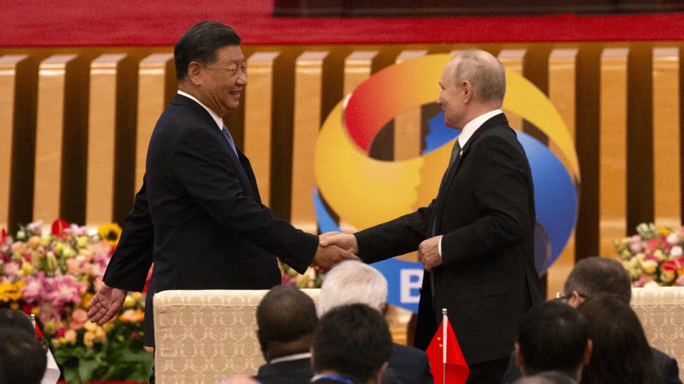 China/Presidente Junping pede a Putin esforços para salvaguardar justiça internacional