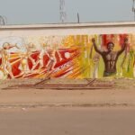 Artistas nacionais e estrangeiros dão com pinturas outro rosto ao  murro do Estádio Lino Correia em Bissau 